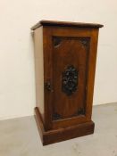 A Carved bedside cabinet