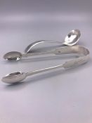 A pair of silver sugar tongs, Exeter 1862 engraved 'Joyce' and a cream ladle Sheffield 1941 Viner