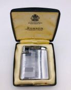 A Ronson lighter in a case