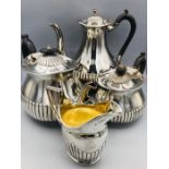 Four piece silver tea service Hallmarked London 1883 by JBH with the milk jug London 1894 by (