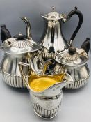 Four piece silver tea service Hallmarked London 1883 by JBH with the milk jug London 1894 by (