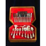 A cased canteen of cutlery.