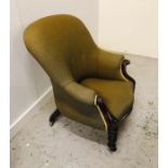 A Large Green upholstered armchair, Victorian.