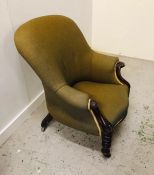 A Large Green upholstered armchair, Victorian.