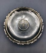 A Sterling silver dish with a central Hong Kong 1 Dollar coin