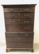 A George III oak chest on chest with brass swan neck handles 112cm w x 57cm d x 182cm h.