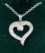 A 14CT white gold Heart shaped diamond set pendant necklace