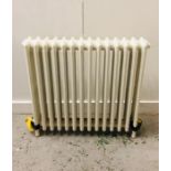 A set of six Victorian cast iron radiators, in school house style 83cm W x 77cm H