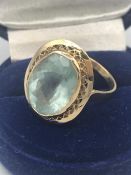 An Aquamarine ring on a 14ct gold setting.