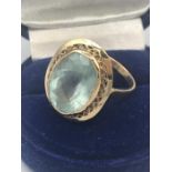 An Aquamarine ring on a 14ct gold setting.