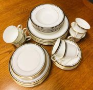 A Royal Doulton 'Pavanne' china dinner service to include Eight plates, eight sode plates, eight tea