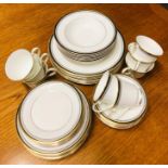 A Royal Doulton 'Pavanne' china dinner service to include Eight plates, eight sode plates, eight tea