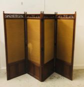 A Mahogany four panel late Victorian screen