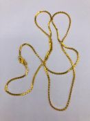 An Asian Gold chain (10.9)