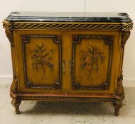 A painted sideboard with marble top.
