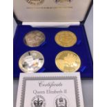 A Boxed set of 22ct gold plated and Sterling Silver plated coins by Tower Mint for Queen Elizabeth