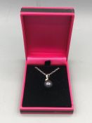 A 14ct white gold south sea pearl and diamond pendant necklace