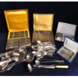 A large volume of silver plated cutlery.
