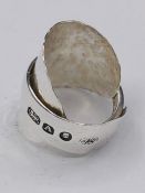 A solid silver spoon ring made from Antique cutlery by an Artisan. Successful bidders can notify