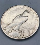 A 1928 Peace silver USA dollar, San Francisco mint
