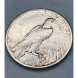 A 1928 Peace silver USA dollar, San Francisco mint