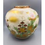 A Japanese vase, cream grounds and floral design, boxed.