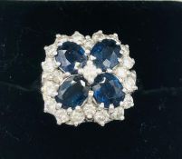 An 18ct White Gold Sapphire and Diamond Cluster ring of 2CT's