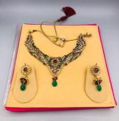 An Asian Jewellery set of semi precious stones, earrings and necklace.