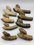 A selection of eight Burmese clay pipe ends.