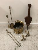 A Brass coal scuttle with brass fire irons and a set of bellows