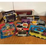 A selection of boxed toy cars and Pokémon to include Batman and Hotwheels.