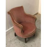 A Rose pink upholstered bedroom chair