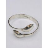 A Hallmarked silver bangle, Artisan made from silver spoons