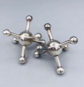 Pair of white metal jack style knife rests