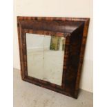 Oyster veneered laburnum cushion framed mirror with later bevelled plate, possibly late 17th