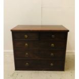 A Two over three drawer chest of drawers in Mahogany.