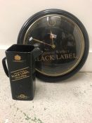 A Johnnie Walker Black Label Wall Clock Along With A Johnnie Walker Jug.