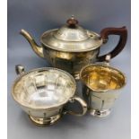 A Silver tea service to include teapot, sugar bowl and milk jug, hallmarked Birmingham 1949-50 (