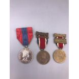 Two London County Council School Attendance Medals and an Elizabeth II Imperial Service Medal