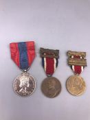 Two London County Council School Attendance Medals and an Elizabeth II Imperial Service Medal