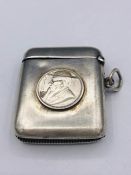 A Boer War silver vesta case with added graffiti by the soldier owner of a pipe and glasses on the