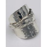 A solid silver spoon ring made from Antique cutlery by an Artisan. Successful bidders can notify