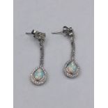 A Pair of silver CZ and Opal drop earrings