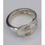 A solid silver spoon ring made from Antique cutlery by an Artisan. Successful bidders can notify