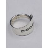 A solid silver spoon ring made from Antique cutlery by an Artisan. Successful bidders can notify