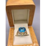 A Swiss Blue Topaz and Diamond Ring 4.8carat Heart shaped cut Topaz with two accent diamonds set