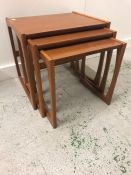 A Mid Century nest of three tables.