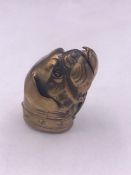 A brass dogs head vesta case