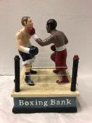 A Cast Iron Boxing themed moneybox