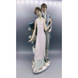 Lladro figure of a Lady and Gent in evening dress and top hat and tails.AF